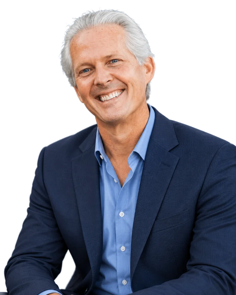 Mark W. Pattison, Mortgage Advisor, smiling in a navy blazer and light blue shirt
